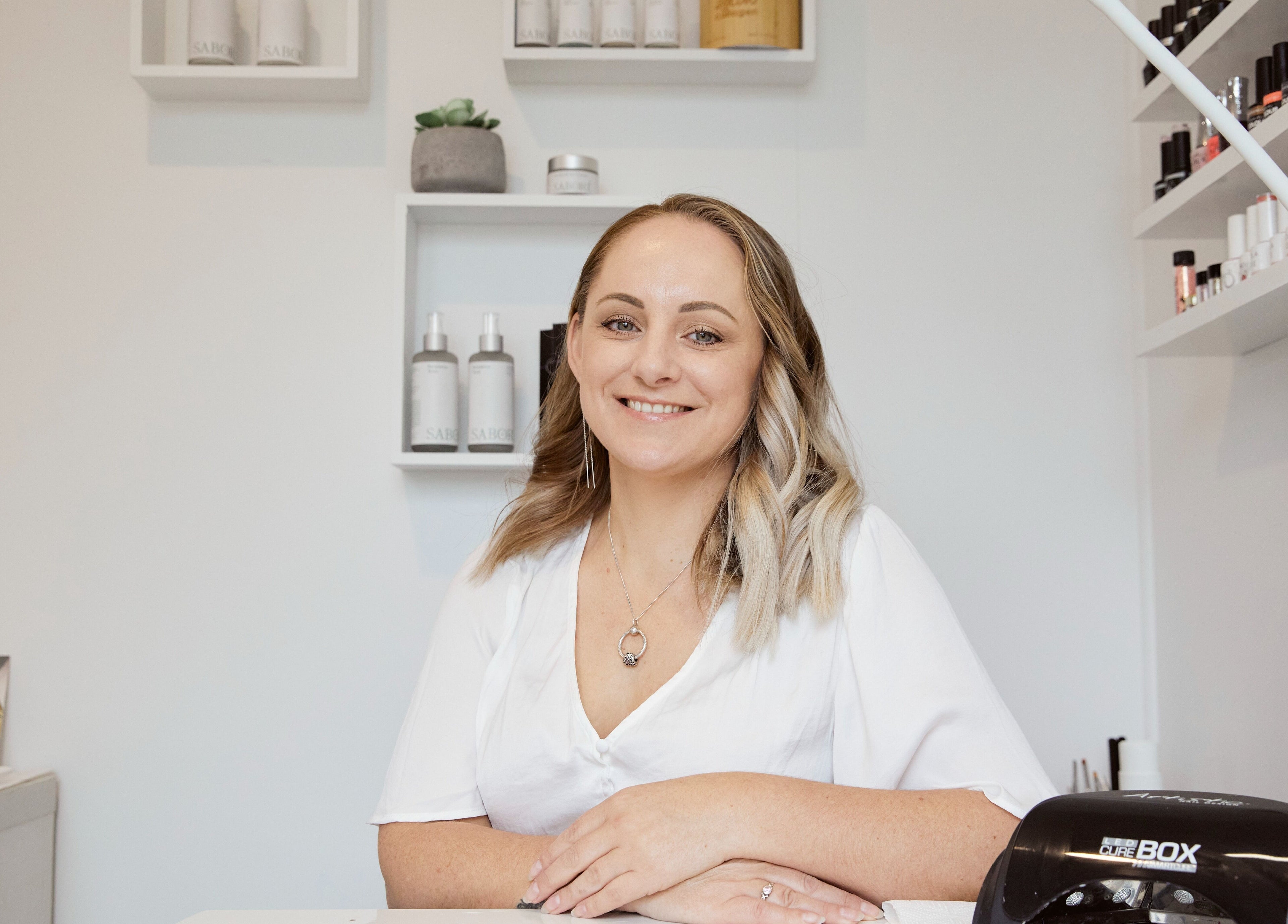 Friendly staff at Fuchsia Beauty Therapy in Nelson, NZ, ready to assist with beauty services.