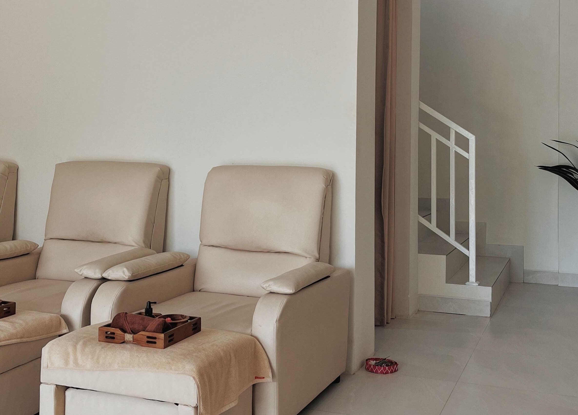 Relaxing seating area at BeautyfulSpa, Bali, Bali, ID with plush chairs and tranquil decor.