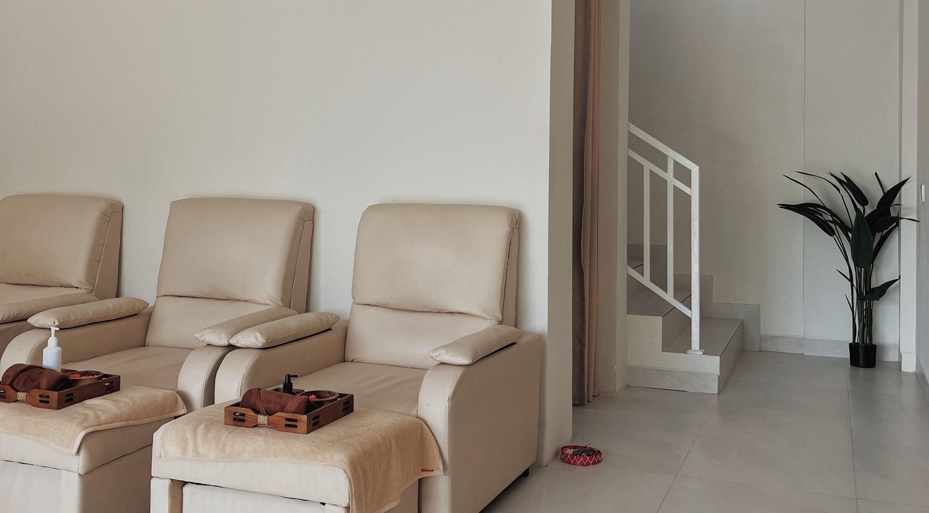 Relaxing seating area at BeautyfulSpa, Bali, Bali, ID with plush chairs and tranquil decor.