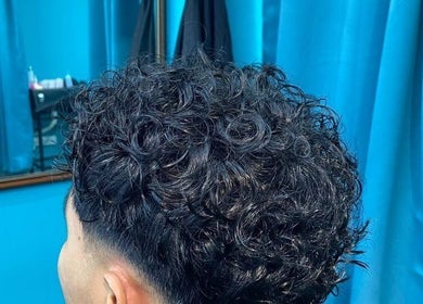 Curly hairstyle at Jnal Gunthink & Jnal Salon, Bandar Penawar, Johor Darul Ta'zim, MY.