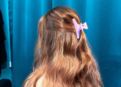 Beautifully styled hair with a clip at Jnal Gunthink & Jnal Salon, Bandar Penawar, Johor Darul Ta'zim, MY.
