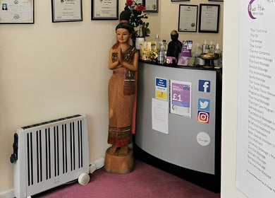 Entrance of Hua Hin Moon Thai Massage, Sunderland, England featuring decor and welcoming statues.