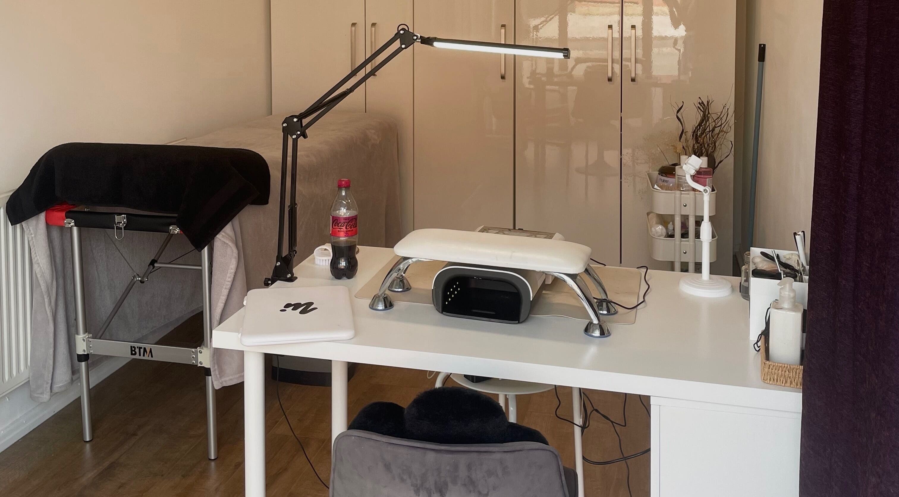 Modern beauty workspace at Belle By Grace in Newton-le-willows, England, GB, showcasing a manicure table and tools.