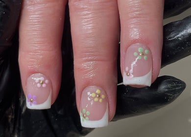 Floral nail art at Belle By Grace in Newton-le-willows, England, GB.