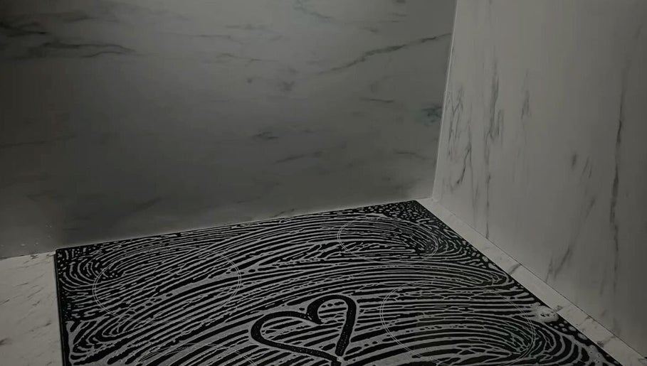 Soap heart and swirls on clean surface at Maid To Sparkle, Rochdale, England, GB.