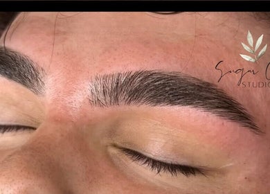 Close-up of expertly shaped eyebrows at Sugar Chic Studios, Idaho Falls, Idaho, US.