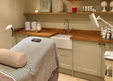 Relaxing treatment room at The Bothy, York, England, GB, featuring a cozy massage bed and calming decor.
