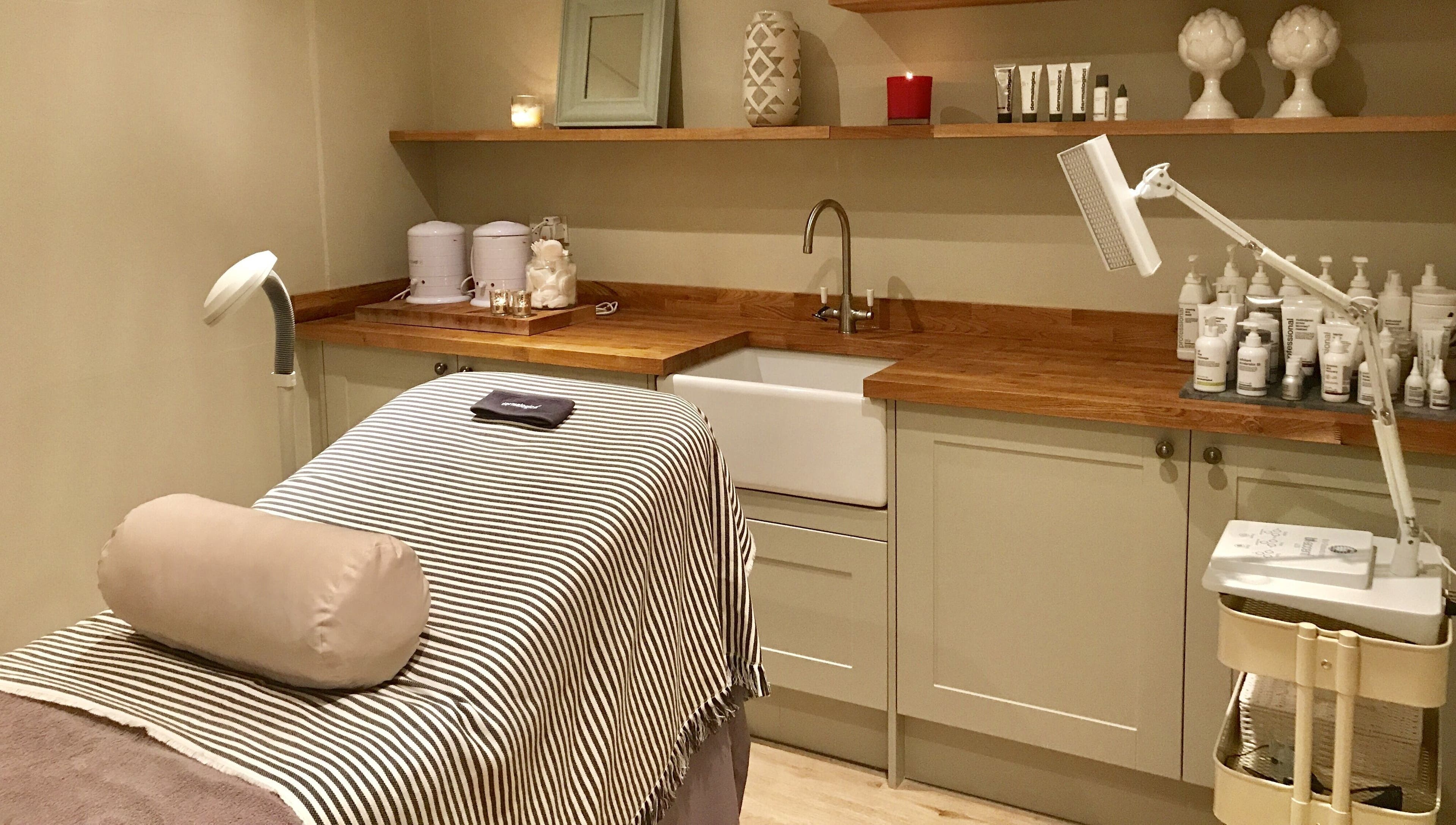 Cozy treatment room at The Bothy, York, England, GB, with a massage table and soothing decor.