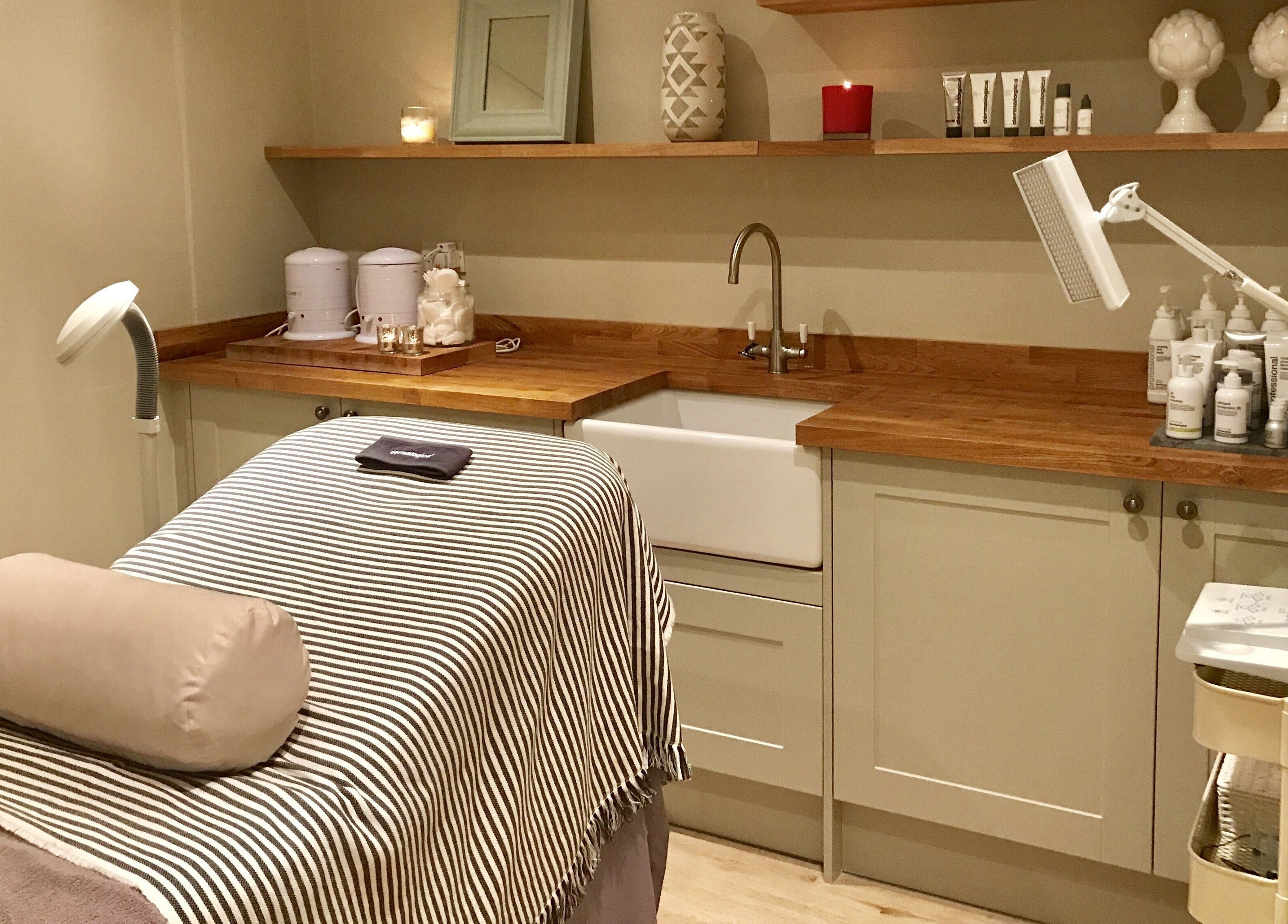 Cozy treatment room at The Bothy, York, England, GB, with a massage table and soothing decor.