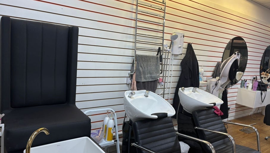 Modern hair salon wash stations at Fifi hair & beauty in Ashton-under-lyne, England, GB.
