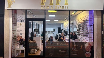 Fifi hair & beauty salon entrance with staff and clients, Ashton-under-lyne, England, GB.