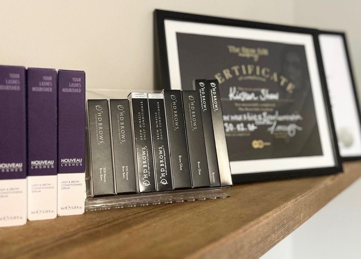 Product and certificate display at Brows By KD, Worksop, England, GB showcasing beauty and wellness excellence.