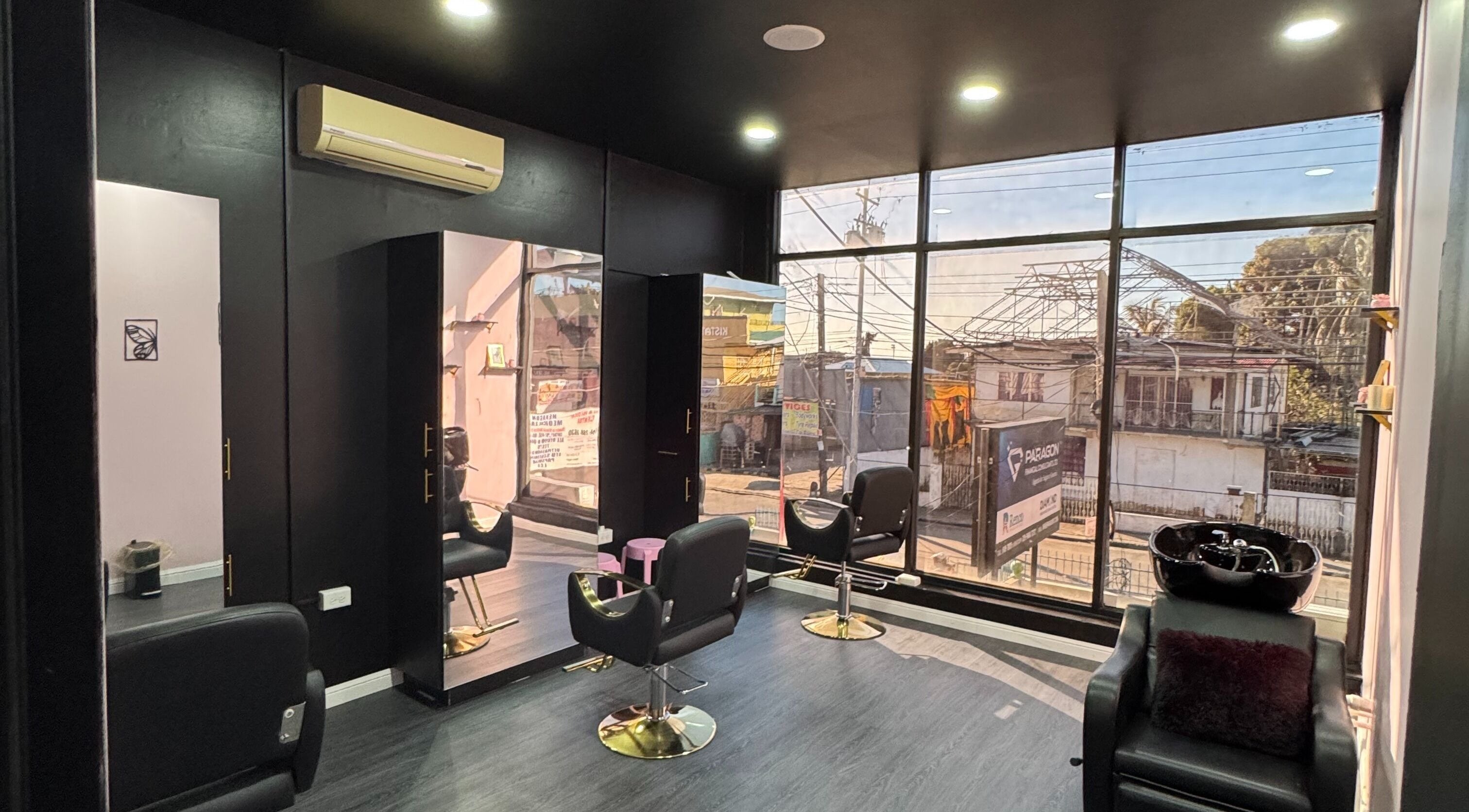 Modern salon interior at GYAL Beauty Bar in Tunapuna, Tunapuna/piarco Regional Corporation, TT with stylish chairs.