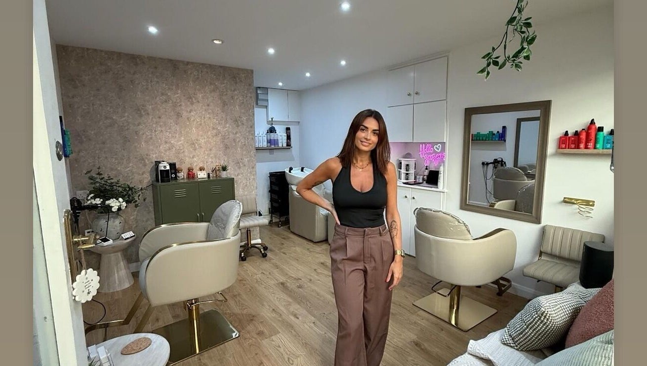 Stylish modern salon interior at Elle by Dani, St Helier, JE, featuring elegant decor and beauty products.