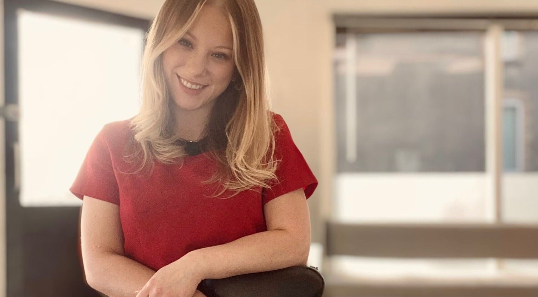 Smiling professional at Leah’s Chair, Kettering, England, GB enhancing your beauty and wellness experience.