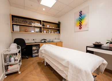 Cozy treatment room at Francisca Wellbeing Studio, London, England, GB. Relaxing space with massage bed and decor.
