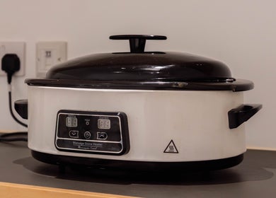 Massage stone heater at Francisca Wellbeing Studio in London, England, GB, on a sleek counter.