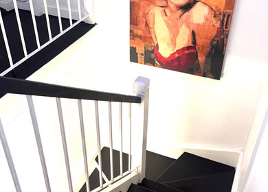 Staircase with vibrant art at Leaha Body & Skin Fix Toowoomba, East Toowoomba, Queensland, AU.