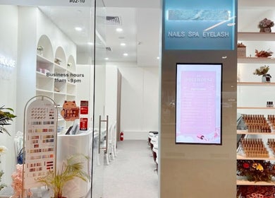 Chic interior of Glazed Nails at Changi City Point, Singapore, SG, showcasing elegant design and service area.