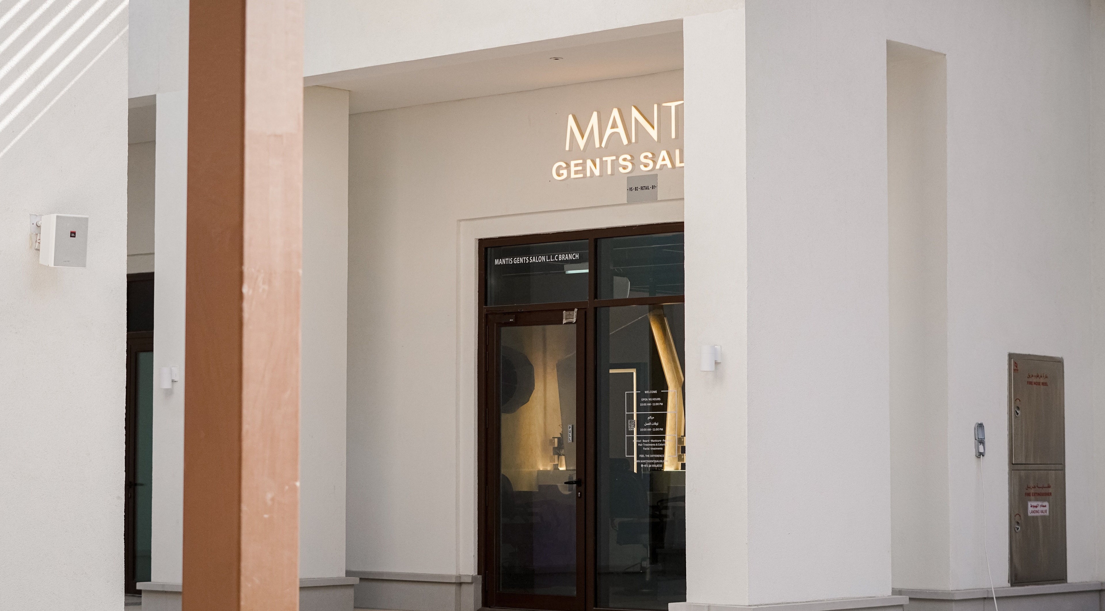 Entrance of Mantis Gent’s Salon - Yas Island, Abu Dhabi, AE showcasing sleek and modern design.