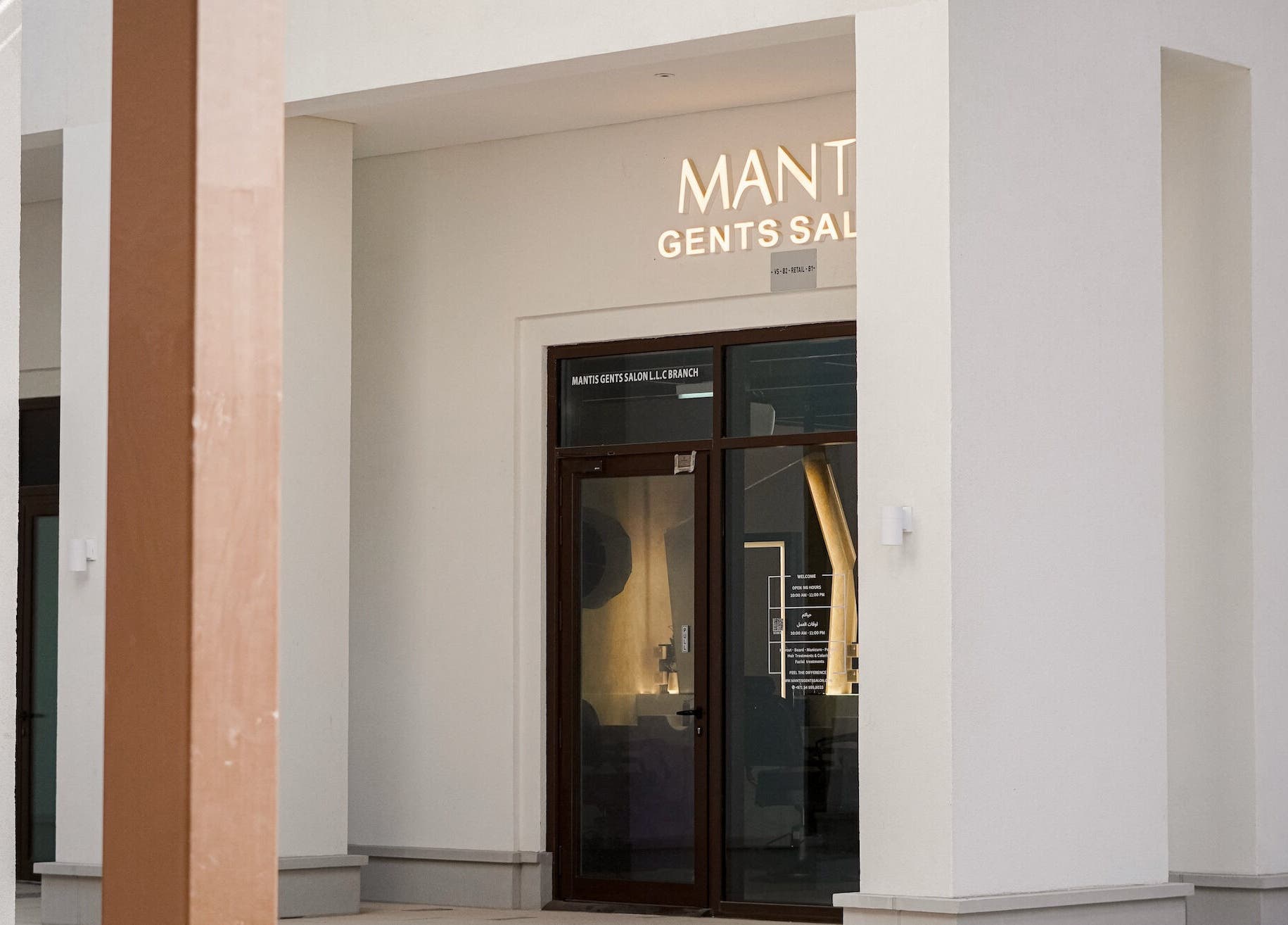 Entrance of Mantis Gent’s Salon - Yas Island, Abu Dhabi, AE: modern design and inviting ambiance.