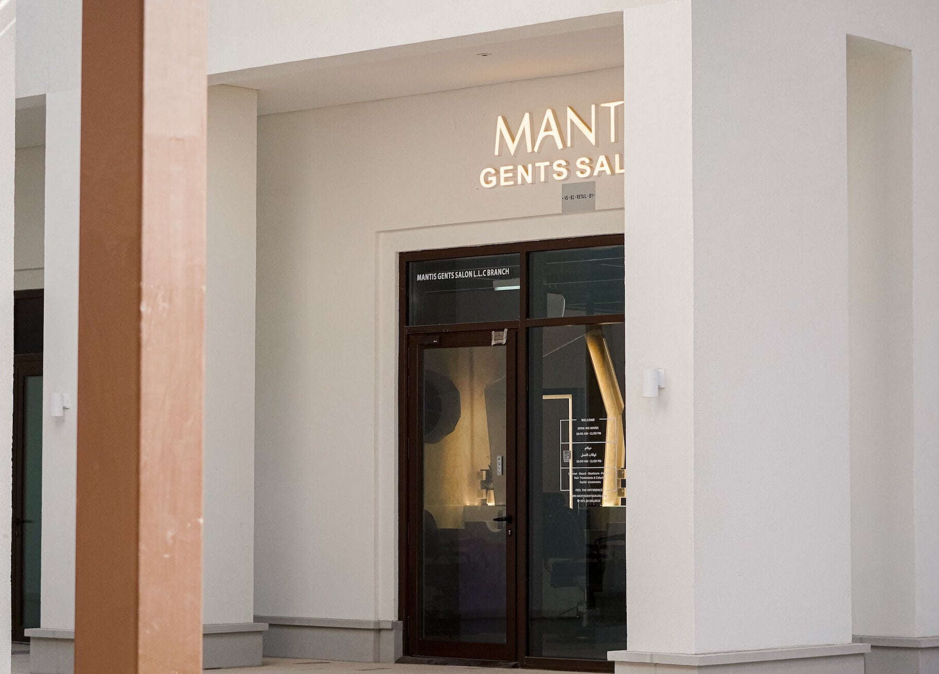 Entrance of Mantis Gent’s Salon - Yas Island, Abu Dhabi, AE: modern design and inviting ambiance.