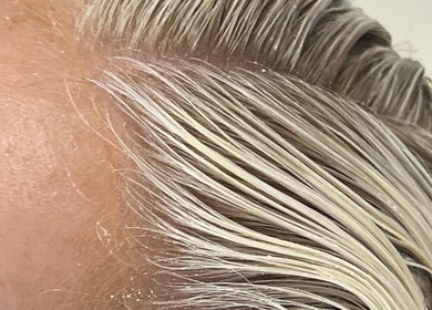 Hair treatment at STUDIO QUE in Innaloo, Western Australia, AU, showcasing sleek, well-styled hair.