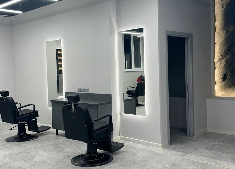 Stylish barber chairs and mirrors at Barber&Co in Chișinău, Chișinău, MD.
