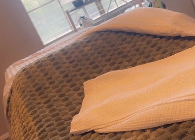 Relaxing spa bed setup at Skintimacy Wellness and Esthetics in Phoenix, Arizona, US.