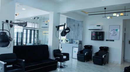 Chic interior of Lauvee Beauty salon and spa, Abuja, Federal Capital Territory, NG with modern seating.