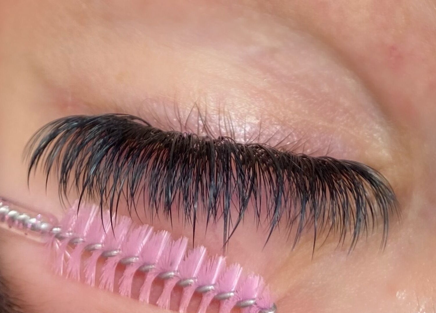 Close-up of eyelash extensions at BlushBeauty salon, Poole, England, GB, highlighting lush, dark lashes.