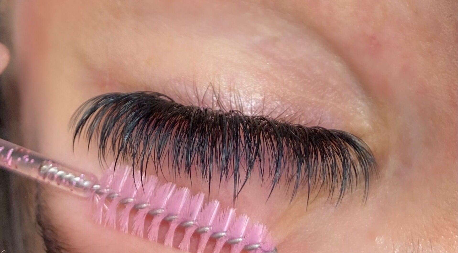Close-up of eyelash extensions at BlushBeauty salon, Poole, England, GB, highlighting lush, dark lashes.