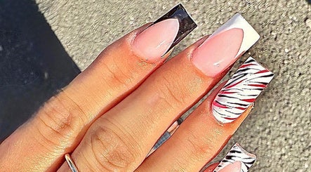 Stylish zebra print nails at Nailsbychloebathgate, Doncaster, England, GB. Perfect for a trendy, bold look.