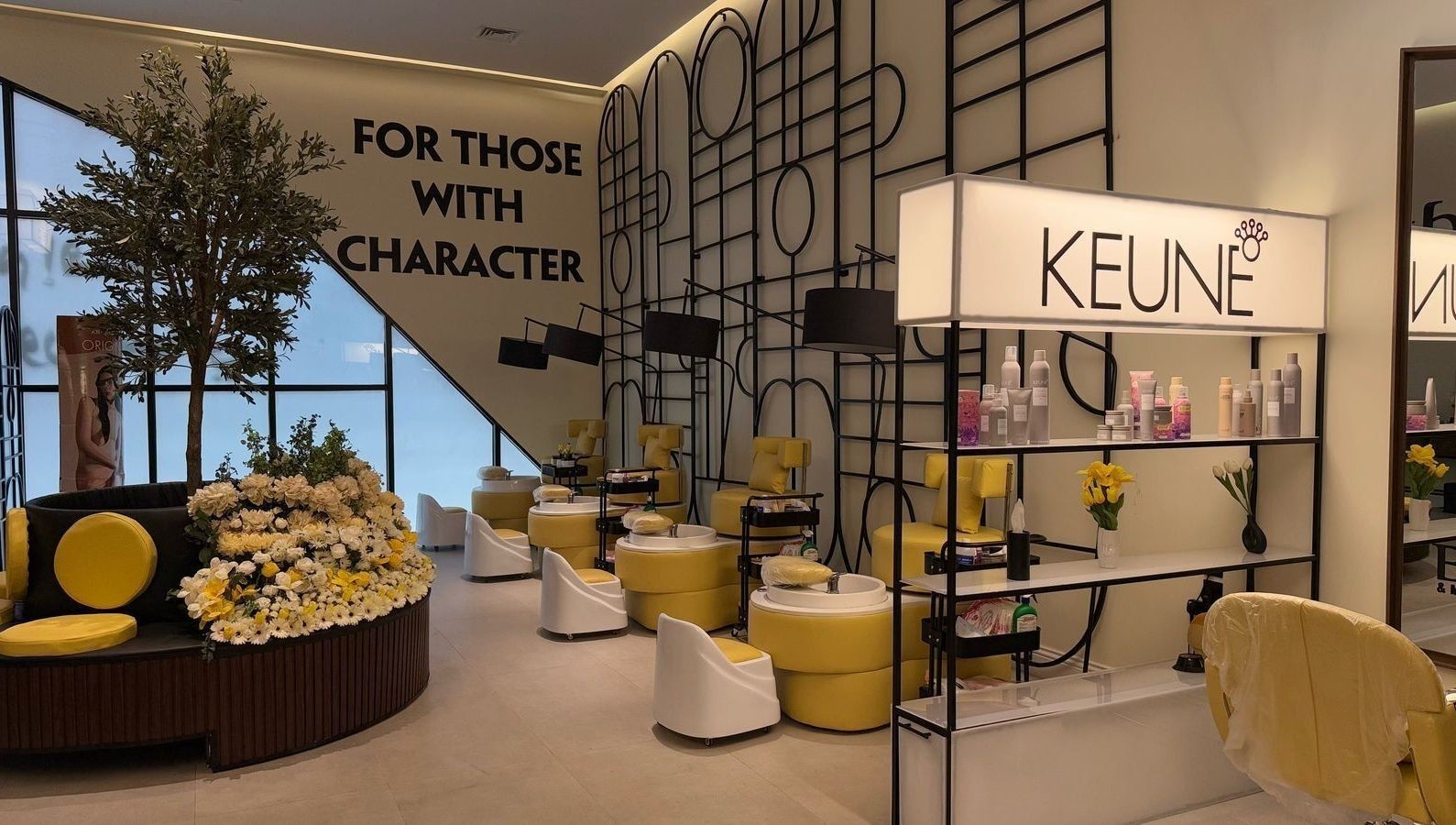 Experience luxury at Body and Mood Spa I مركز بودي آند مود سبا in Al Hofuf, Eastern Province, SA. Yellow-themed decor.