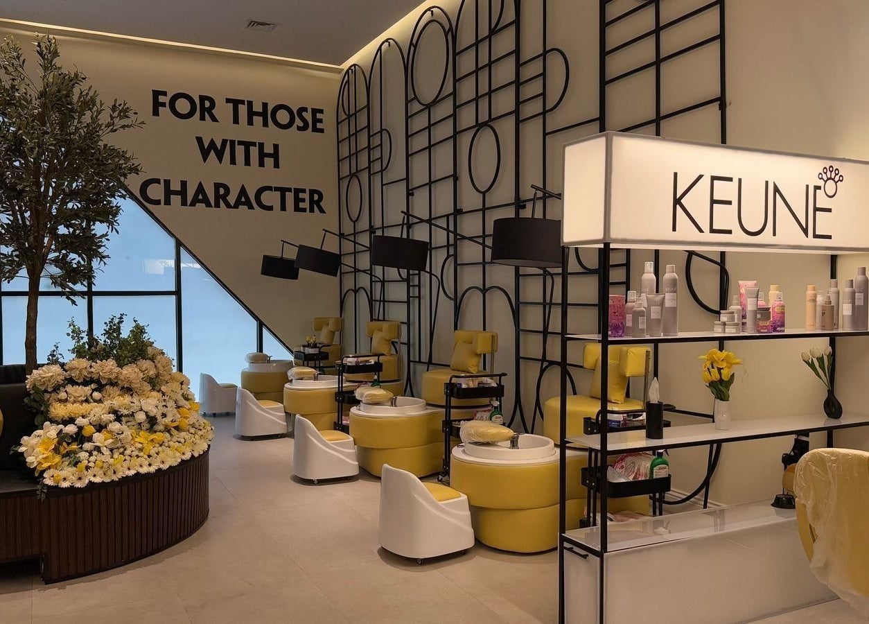 Experience luxury at Body and Mood Spa I مركز بودي آند مود سبا in Al Hofuf, Eastern Province, SA. Yellow-themed decor.