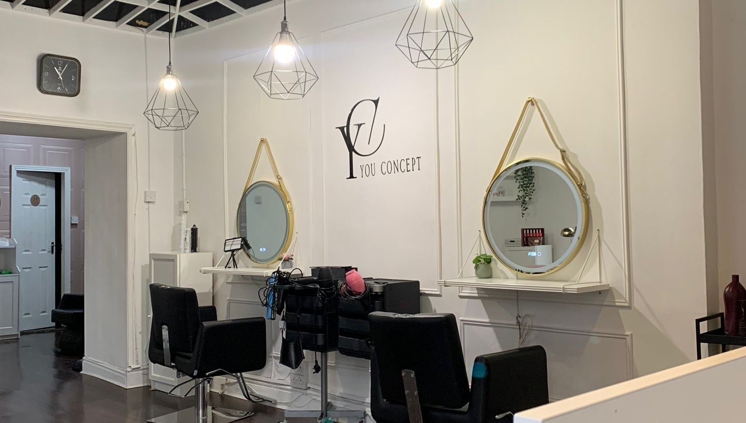 Salon interior at You Concept, Dublin, County Dublin, IE featuring chic mirrors and stylish seating.