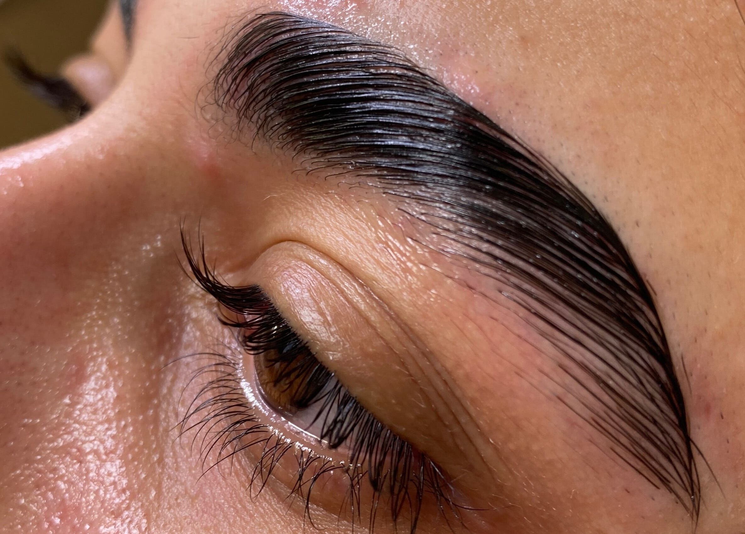 Close-up of expertly groomed brow at Brow and Glow, Bolton, England, GB. Showcasing precision and style.