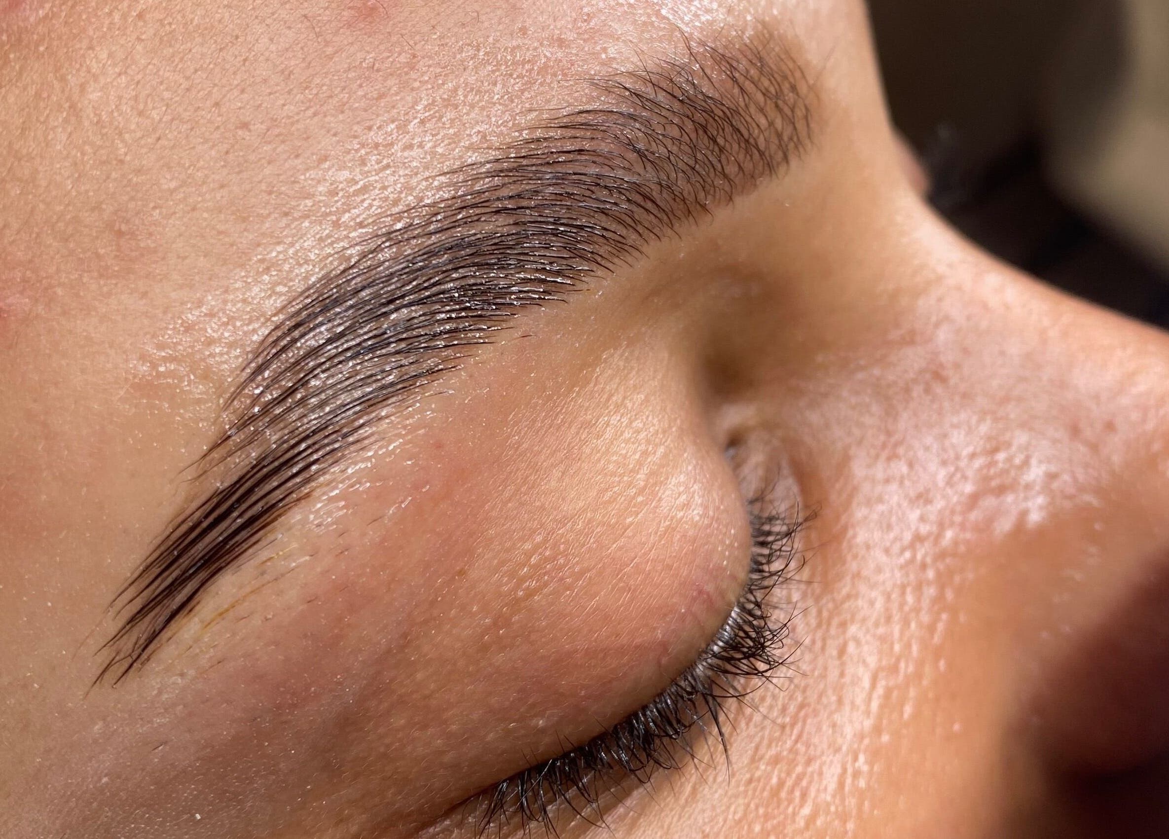 Perfectly shaped eyebrows at Brow and Glow, Bolton, England, GB for a polished look.