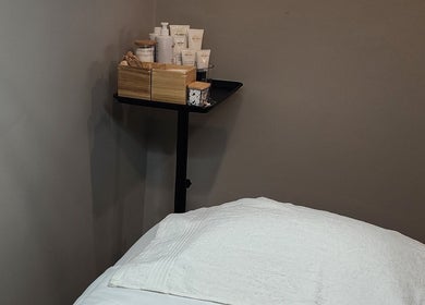 Tranquil treatment room with skincare products at Optiview Skin and Laser Clinic, Surrey, British Columbia, CA.