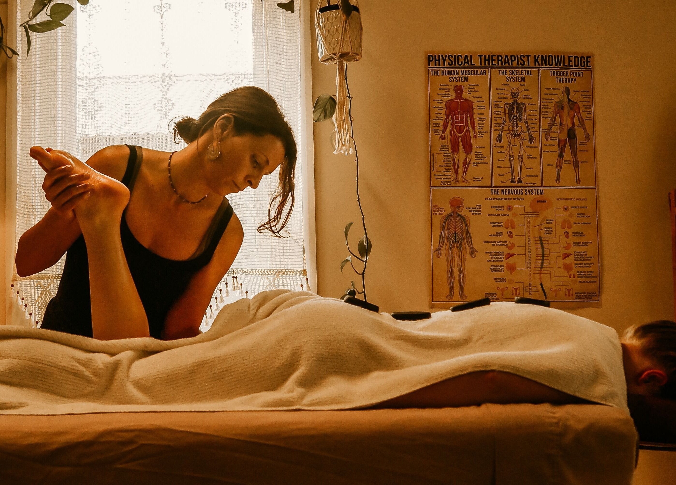 Massage therapy session at The Temple Of Bliss, Colac, Victoria, AU, offering relaxation and wellness.