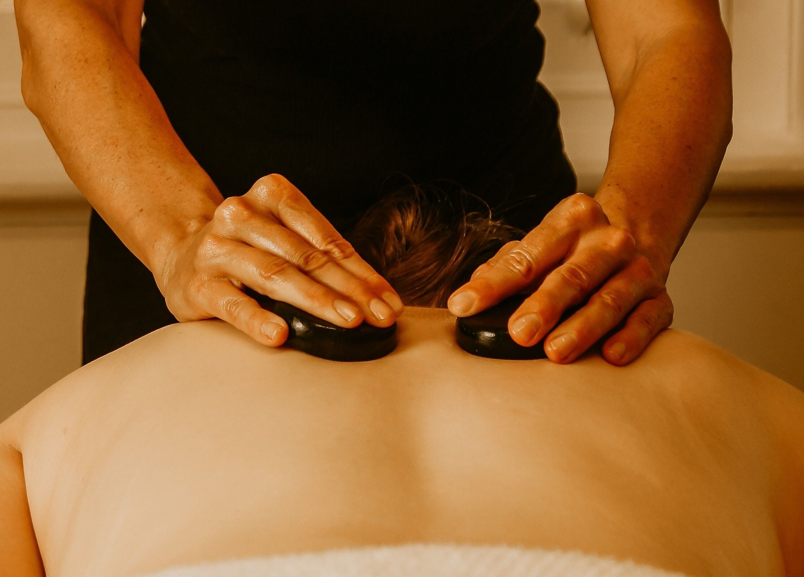 Hot stone massage at The Temple Of Bliss, Colac, Victoria, AU. Experience ultimate relaxation and rejuvenation.