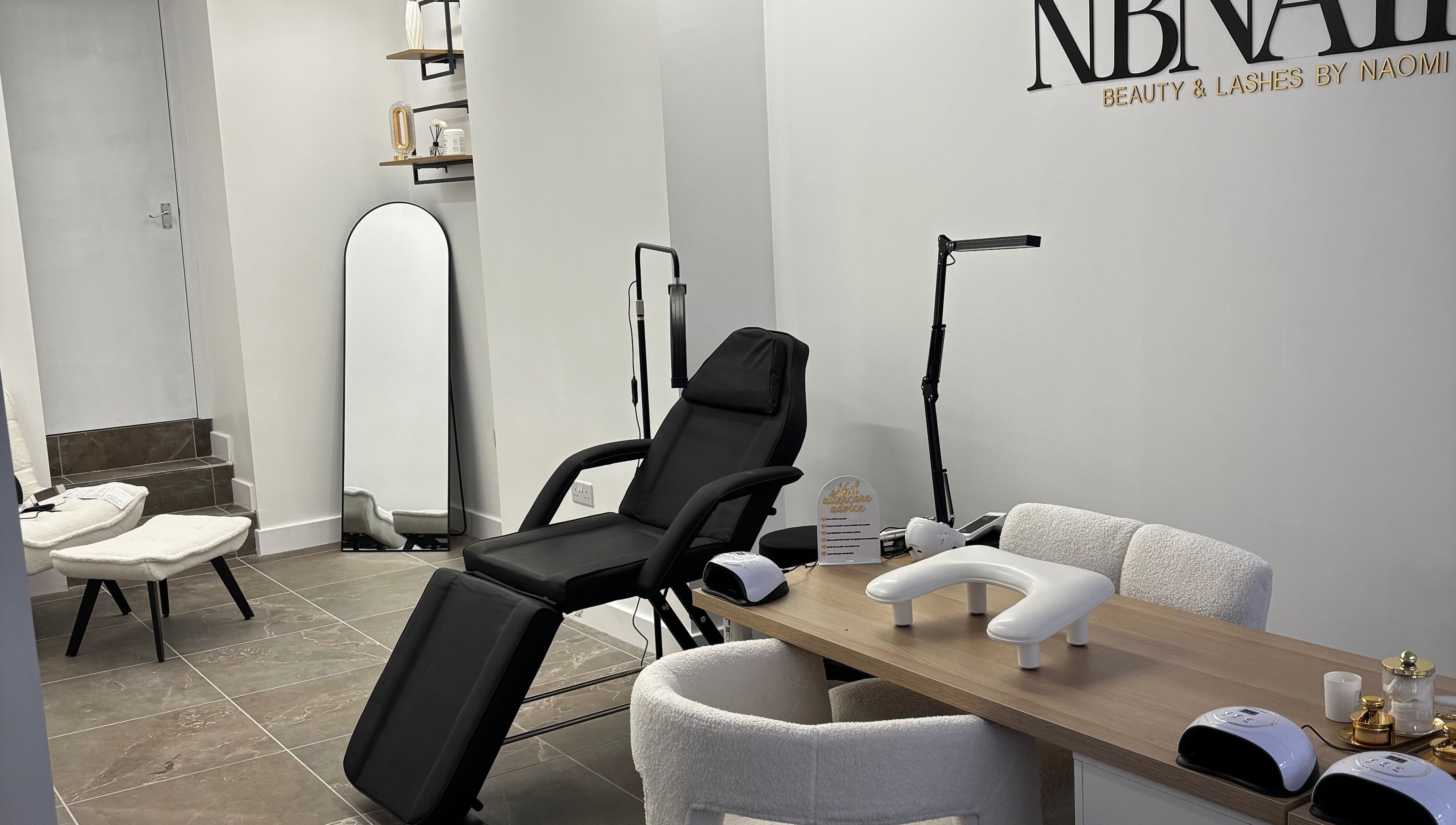 Chic interior of Nbnailz in Maryport, England, GB with modern nail and lash equipment.