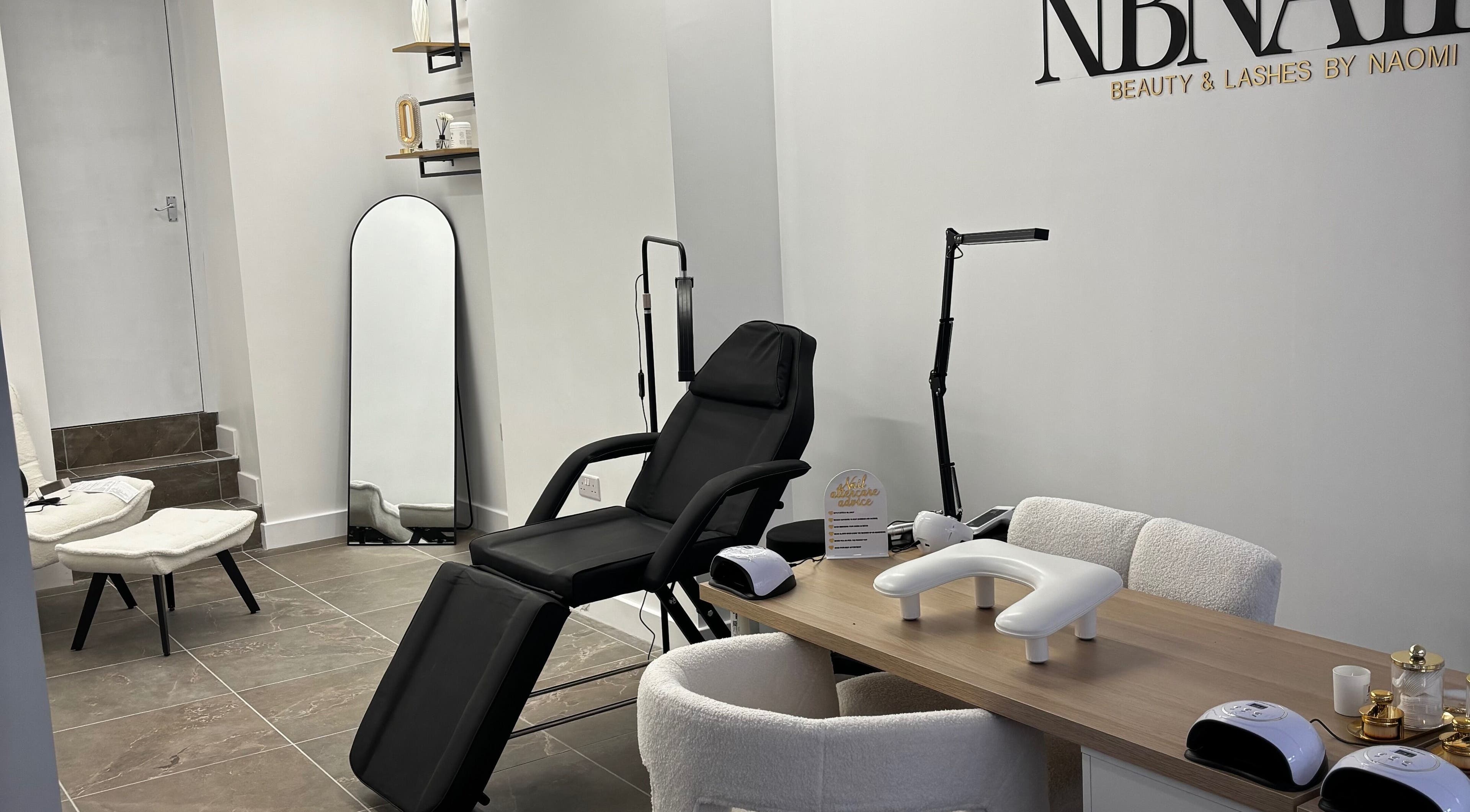 Chic interior of Nbnailz in Maryport, England, GB with modern nail and lash equipment.