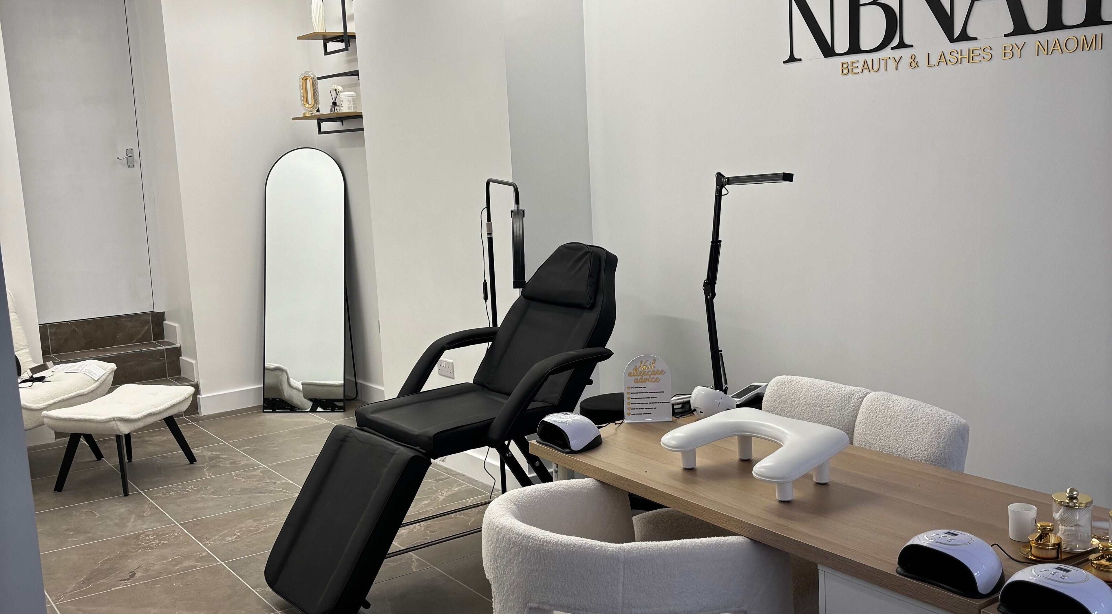 Chic interior of Nbnailz in Maryport, England, GB with modern nail and lash equipment.
