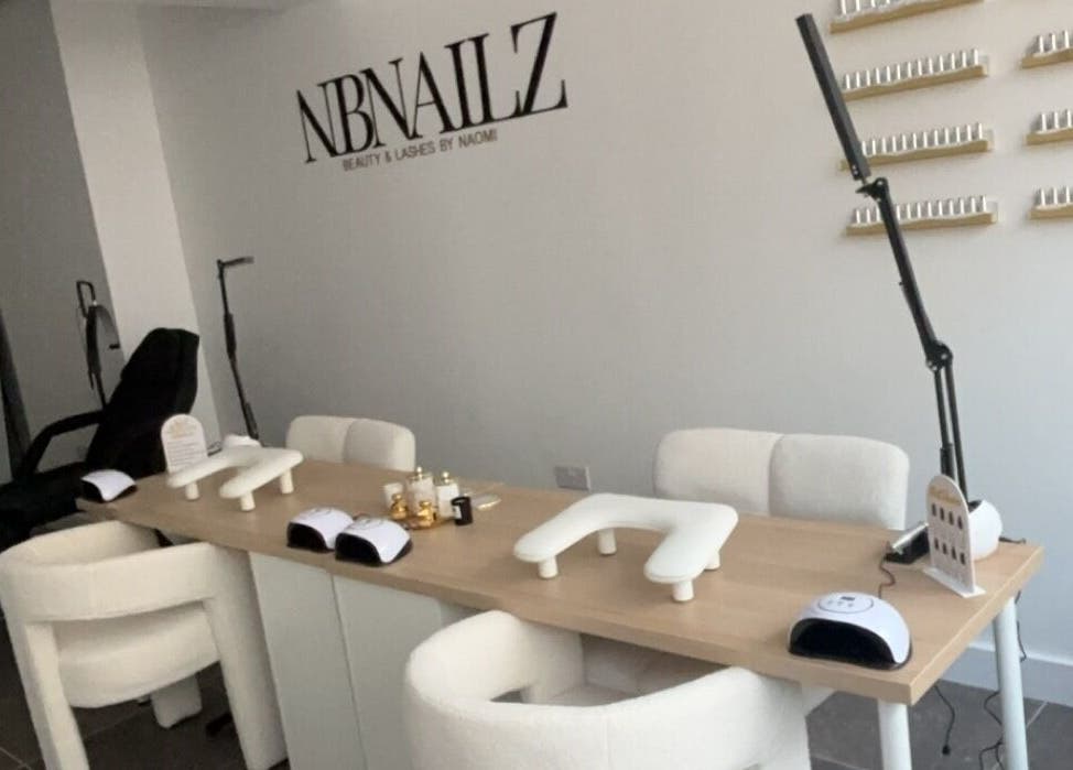 Stylish interior of Nbnailz in Maryport, England, GB featuring modern nail stations and comfortable seating.