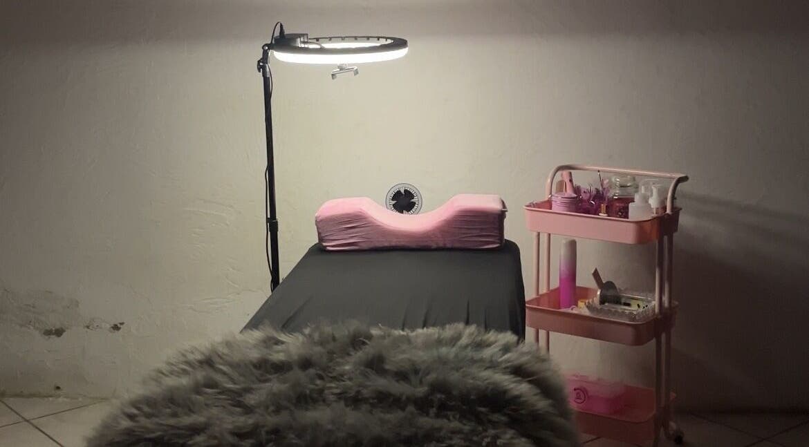 Cozy setup at Whimsical Lashes in Alberton, Gauteng, ZA, featuring a treatment bed and beauty cart.