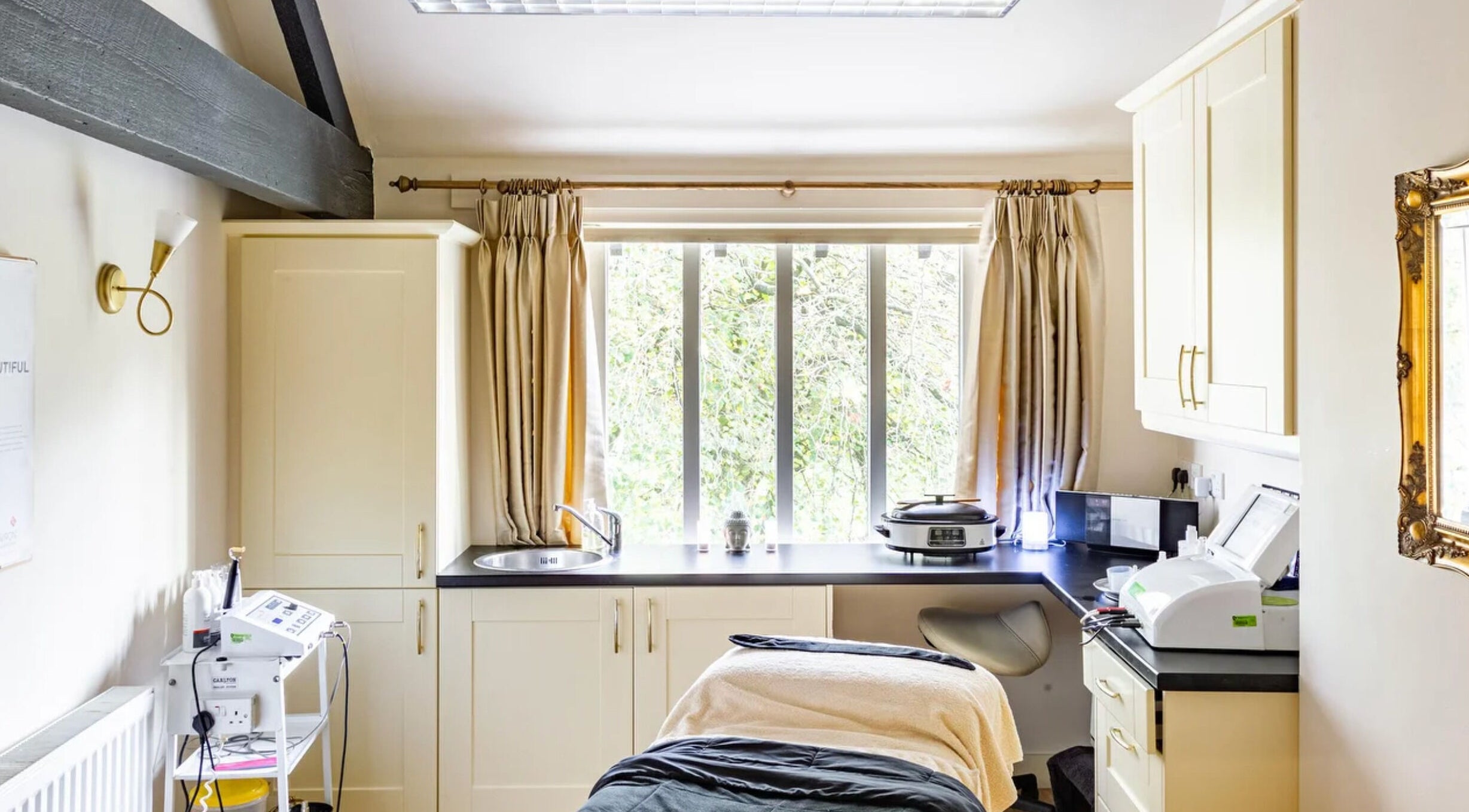 Relaxing treatment room at The Knutsford Medi & Beauty Spa, Knutsford, England, GB with a serene ambiance.