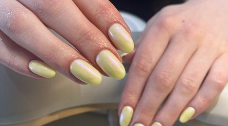 Elegant lemon-yellow nails at By Sophie, Knowle, England, GB, showcasing expert manicure service.
