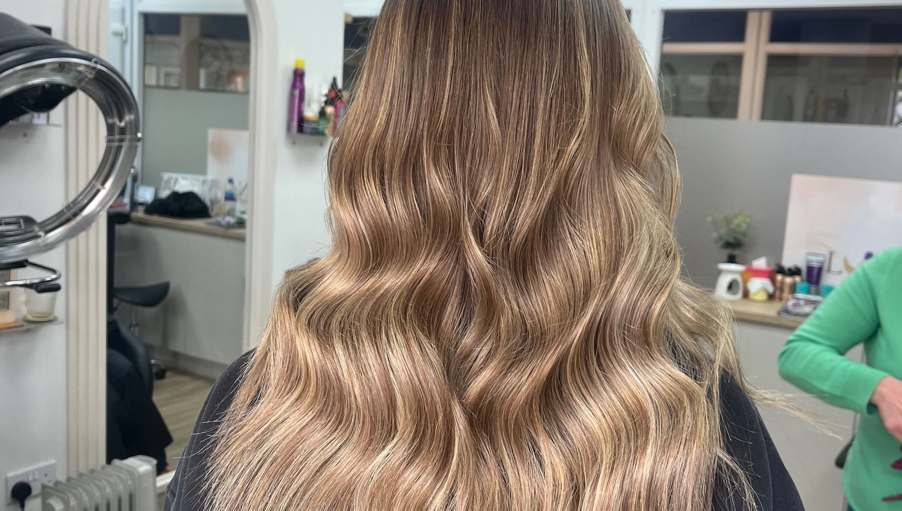 Glamorous wavy hairstyle at Bethany Jade Hairdressing, Cannock, England, GB salon.
