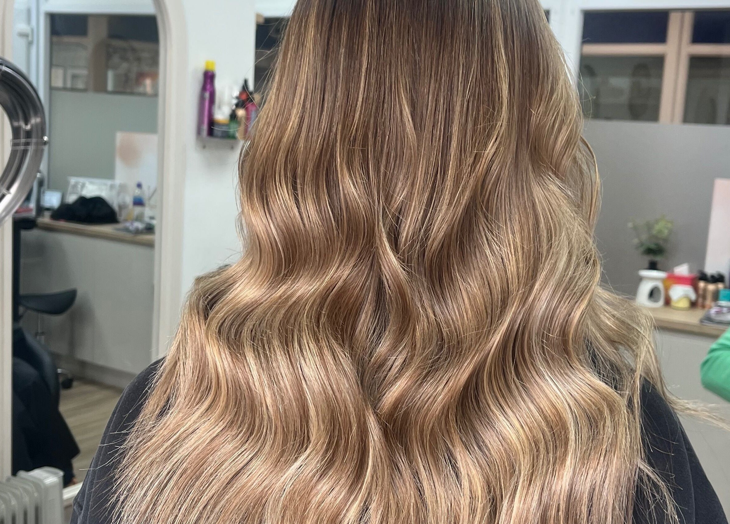 Glamorous wavy hairstyle at Bethany Jade Hairdressing, Cannock, England, GB salon.